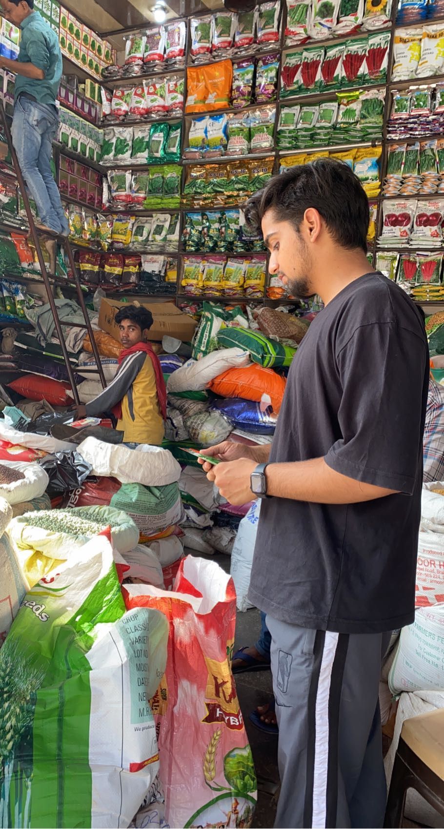 Anmol Rajput in black t-shirt.